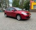 Красный Ниссан Тиида, объемом двигателя 1.6 л и пробегом 45 тыс. км за 8600 $, фото 1 на Automoto.ua