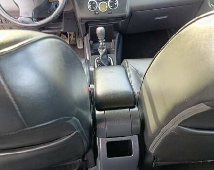 Красный Ниссан Тиида, объемом двигателя 1.8 л и пробегом 175 тыс. км за 5600 $, фото 11 на Automoto.ua