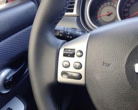 Красный Ниссан Тиида, объемом двигателя 1.6 л и пробегом 170 тыс. км за 5600 $, фото 3 на Automoto.ua