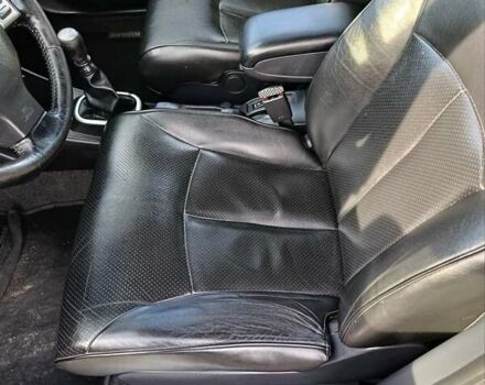 Красный Ниссан Тиида, объемом двигателя 1.8 л и пробегом 175 тыс. км за 5600 $, фото 9 на Automoto.ua