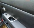 Красный Ниссан Тиида, объемом двигателя 1.8 л и пробегом 229 тыс. км за 5700 $, фото 2 на Automoto.ua