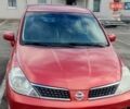 Червоний Ніссан Тііда, об'ємом двигуна 1.6 л та пробігом 250 тис. км за 6200 $, фото 1 на Automoto.ua