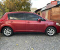 Червоний Ніссан Тііда, об'ємом двигуна 1.6 л та пробігом 147 тис. км за 5000 $, фото 1 на Automoto.ua