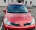 Красный Ниссан Тиида, объемом двигателя 1.6 л и пробегом 250 тыс. км за 6200 $, фото 1 на Automoto.ua