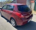 Красный Ниссан Тиида, объемом двигателя 1.8 л и пробегом 175 тыс. км за 5600 $, фото 1 на Automoto.ua