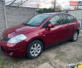 Красный Ниссан Тиида, объемом двигателя 1.6 л и пробегом 149 тыс. км за 6500 $, фото 1 на Automoto.ua