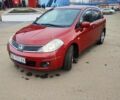 Красный Ниссан Тиида, объемом двигателя 1.8 л и пробегом 229 тыс. км за 5700 $, фото 1 на Automoto.ua
