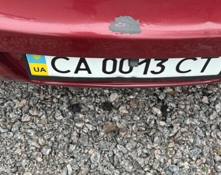 Красный Ниссан Тиида, объемом двигателя 1.6 л и пробегом 145 тыс. км за 5387 $, фото 10 на Automoto.ua