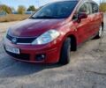 Красный Ниссан Тиида, объемом двигателя 1.6 л и пробегом 170 тыс. км за 5600 $, фото 1 на Automoto.ua