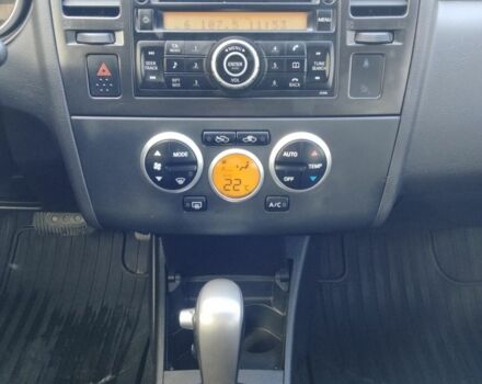 Красный Ниссан Тиида, объемом двигателя 1.6 л и пробегом 170 тыс. км за 5600 $, фото 4 на Automoto.ua