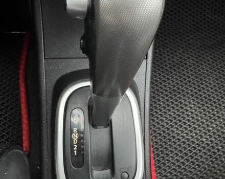 Красный Ниссан Тиида, объемом двигателя 1.6 л и пробегом 145 тыс. км за 5387 $, фото 7 на Automoto.ua