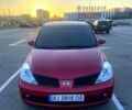 Червоний Ніссан Тііда, об'ємом двигуна 1.6 л та пробігом 195 тис. км за 5000 $, фото 1 на Automoto.ua