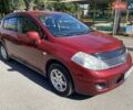 Красный Ниссан Тиида, объемом двигателя 1.8 л и пробегом 175 тыс. км за 5600 $, фото 3 на Automoto.ua