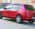 Красный Ниссан Тиида, объемом двигателя 1.6 л и пробегом 180 тыс. км за 5999 $, фото 2 на Automoto.ua