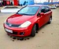 Красный Ниссан Тиида, объемом двигателя 1.8 л и пробегом 240 тыс. км за 5500 $, фото 1 на Automoto.ua