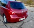 Красный Ниссан Тиида, объемом двигателя 1.6 л и пробегом 170 тыс. км за 5600 $, фото 2 на Automoto.ua