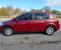 Красный Ниссан Тиида, объемом двигателя 1.6 л и пробегом 170 тыс. км за 5600 $, фото 1 на Automoto.ua