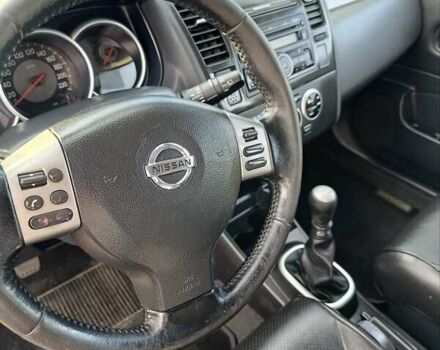 Красный Ниссан Тиида, объемом двигателя 1.8 л и пробегом 175 тыс. км за 5600 $, фото 4 на Automoto.ua