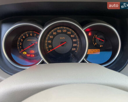 Червоний Ніссан Тііда, об'ємом двигуна 1.6 л та пробігом 147 тис. км за 5000 $, фото 17 на Automoto.ua
