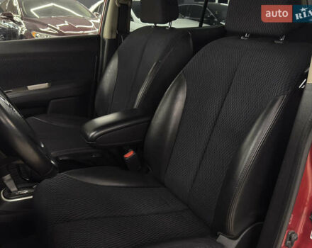 Красный Ниссан Тиида, объемом двигателя 1.5 л и пробегом 68 тыс. км за 7599 $, фото 15 на Automoto.ua