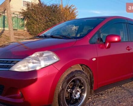 Красный Ниссан Тиида, объемом двигателя 1.5 л и пробегом 59 тыс. км за 7500 $, фото 1 на Automoto.ua