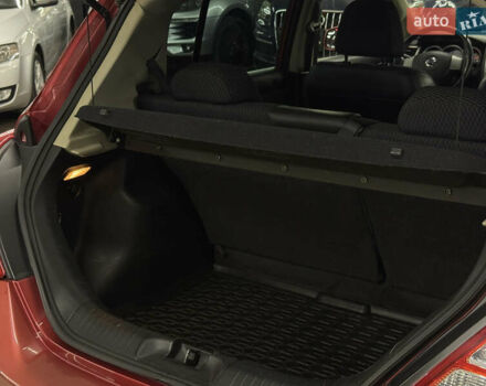 Красный Ниссан Тиида, объемом двигателя 1.5 л и пробегом 68 тыс. км за 7599 $, фото 23 на Automoto.ua