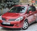 Красный Ниссан Тиида, объемом двигателя 1.5 л и пробегом 91 тыс. км за 7999 $, фото 1 на Automoto.ua