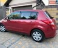 Красный Ниссан Тиида, объемом двигателя 1.5 л и пробегом 87 тыс. км за 8200 $, фото 1 на Automoto.ua
