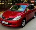 Красный Ниссан Тиида, объемом двигателя 1.5 л и пробегом 98 тыс. км за 7999 $, фото 1 на Automoto.ua
