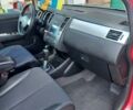Червоний Ніссан Тііда, об'ємом двигуна 1.5 л та пробігом 70 тис. км за 8800 $, фото 1 на Automoto.ua