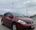 Красный Ниссан Тиида, объемом двигателя 1.6 л и пробегом 59 тыс. км за 9900 $, фото 1 на Automoto.ua