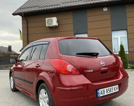 Красный Ниссан Тиида, объемом двигателя 1.6 л и пробегом 59 тыс. км за 9900 $, фото 1 на Automoto.ua