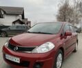 Красный Ниссан Тиида, объемом двигателя 1.6 л и пробегом 59 тыс. км за 9900 $, фото 1 на Automoto.ua