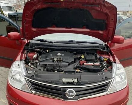 Красный Ниссан Тиида, объемом двигателя 1.6 л и пробегом 59 тыс. км за 9900 $, фото 6 на Automoto.ua