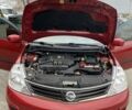 Красный Ниссан Тиида, объемом двигателя 1.6 л и пробегом 59 тыс. км за 9900 $, фото 6 на Automoto.ua