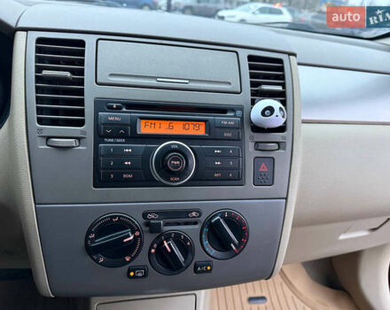 Красный Ниссан Тиида, объемом двигателя 1.6 л и пробегом 118 тыс. км за 5850 $, фото 26 на Automoto.ua