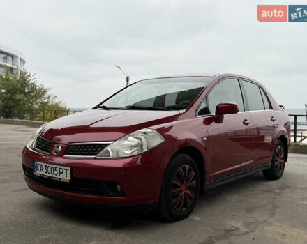 Красный Ниссан Тиида, объемом двигателя 1.6 л и пробегом 227 тыс. км за 5900 $, фото 2 на Automoto.ua