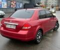 Красный Ниссан Тиида, объемом двигателя 1.6 л и пробегом 118 тыс. км за 5850 $, фото 3 на Automoto.ua