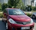 Красный Ниссан Тиида, объемом двигателя 1.6 л и пробегом 193 тыс. км за 7550 $, фото 1 на Automoto.ua