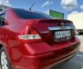 Красный Ниссан Тиида, объемом двигателя 1.6 л и пробегом 193 тыс. км за 7550 $, фото 6 на Automoto.ua