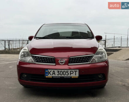 Красный Ниссан Тиида, объемом двигателя 1.6 л и пробегом 227 тыс. км за 5900 $, фото 3 на Automoto.ua