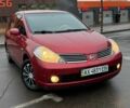 Красный Ниссан Тиида, объемом двигателя 1.6 л и пробегом 118 тыс. км за 5850 $, фото 1 на Automoto.ua