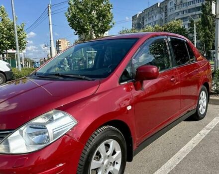 Красный Ниссан Тиида, объемом двигателя 1.6 л и пробегом 193 тыс. км за 7550 $, фото 2 на Automoto.ua