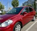 Красный Ниссан Тиида, объемом двигателя 1.6 л и пробегом 193 тыс. км за 7550 $, фото 2 на Automoto.ua