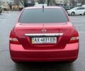 Красный Ниссан Тиида, объемом двигателя 1.6 л и пробегом 118 тыс. км за 5850 $, фото 4 на Automoto.ua