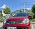 Красный Ниссан Тиида, объемом двигателя 1.6 л и пробегом 193 тыс. км за 7550 $, фото 1 на Automoto.ua