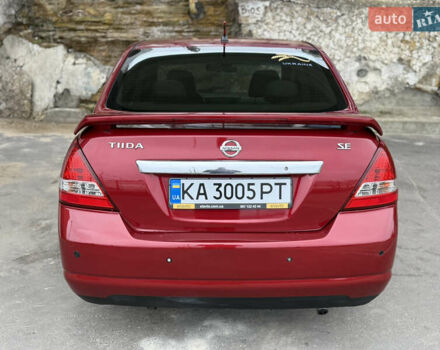 Красный Ниссан Тиида, объемом двигателя 1.6 л и пробегом 227 тыс. км за 5900 $, фото 6 на Automoto.ua