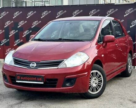 Красный Ниссан Тиида, объемом двигателя 1.6 л и пробегом 155 тыс. км за 6800 $, фото 2 на Automoto.ua