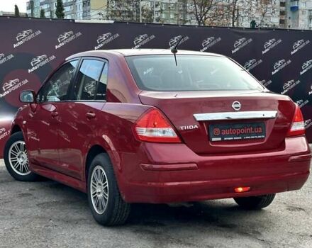 Красный Ниссан Тиида, объемом двигателя 1.6 л и пробегом 155 тыс. км за 6800 $, фото 7 на Automoto.ua