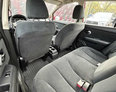 Красный Ниссан Тиида, объемом двигателя 1.6 л и пробегом 155 тыс. км за 6800 $, фото 12 на Automoto.ua